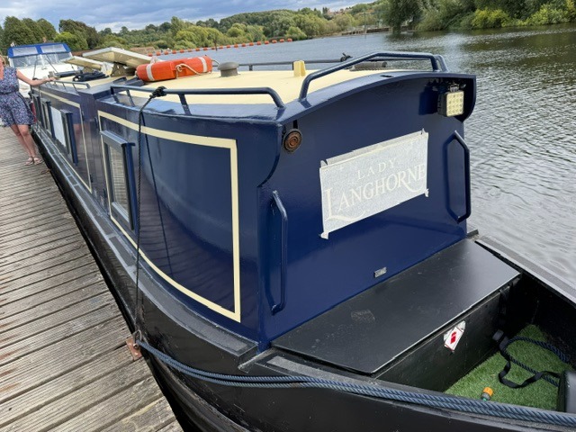 Boat name being fitted to narrowboat